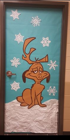 a door decorated with an image of a dog and snowflakes