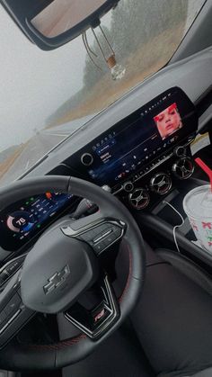 the interior of a car with an electronic display