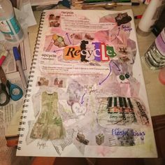 an open notebook with paper collages, scissors and other crafting supplies on it