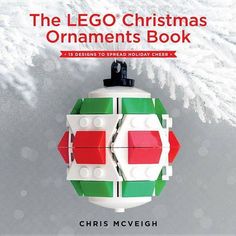 the lego christmas ornament book is designed to be holiday - themed, and features an ornament