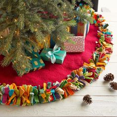 a christmas tree skirt made out of ribbon