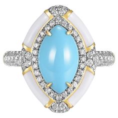 Embrace timeless elegance with our marquise-cut Sleeping Beauty turquoise ring, showcasing a substantial 2.08 carat centerpiece. Esteemed for its pristine, solid light blue shade without any matrix, each turquoise is diligently sourced from the acclaimed Sleeping Beauty Mine. The ring's brilliance is further enhanced by 0.51 carats of sparkling white round diamonds, beautifully complementing the turquoise's serene hue. Expertly set in 18 karat yellow gold, this ring boasts a modern touch with white enamel gracing its sides. Specifications: Centerpiece: Marquise Sleeping Beauty Turquoise, 2.08 carats Accents: White Round Diamonds, 0.51 carats Detailed with White Enamel on the side Metal: 18 Karat Yellow Gold Size: US 6.25 (Resizing available upon request) For a cohesive and enchanting ensem Turquoise Diamond Ring, Turquoise Diamond Rings, Sleeping Beauty Turquoise, White Enamel, Cocktail Rings, Matching Earrings, Turquoise Ring, Round Diamonds, Timeless Elegance