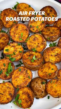 a white plate topped with cooked potatoes and parsley