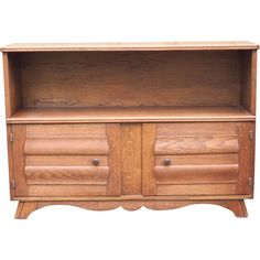 a wooden cabinet with two drawers on one side and an open drawer on the other