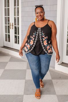 This is a beautiful addition to your wardrobe. Slimming detail on this tulip style tank. Adjustable straps, embroidered decor, and 100% rayon. #floraltop #backtotheoffice #officewear #officestyle #zoomoutfit #officeworkwear #blouse #floralblouse Jumpsuit Layering, White Skinnies, Garden Picnic, Embroidered Tank, Gloomy Day, Tan Sandals, Cute Spring, Spring Inspiration, Fall Collections