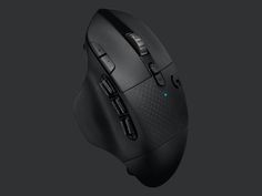 a black computer mouse on a gray background