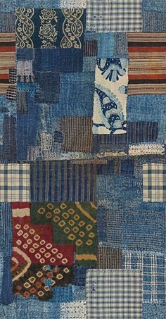 an old patchwork quilt with different colors and patterns