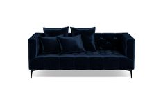 a black couch with four pillows on it and one pillow in the middle, sitting against a white background