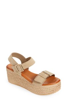 Braided trims add a subtle, earthy element to a versatile platform wedge sandal complete with a buckled strap. 2 1/2" heel; 1 1/2" platform (size 8.5US/39EU) Cushioned footbed Leather upper/leather and textile lining/synthetic sole Made in Spain Platform Wedge