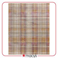 an orange and yellow plaid rug