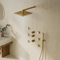 a shower head and hand held shower faucet in a bathroom