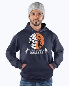 a man wearing a blue hoodie with an image of a basketball player on it