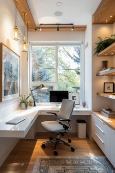 a home office with a large window, desk and chair