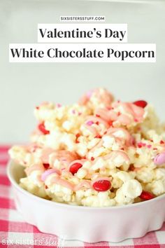 valentine's day white chocolate popcorn in a bowl on a checkered tablecloth