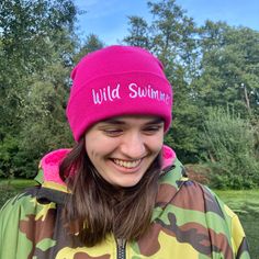 'Wild Swimmer' -  A hot pink, soft-feel embroidered beanie with double knit layer so you can stay warm both in and out of the water. This bright, trendy, uniquely embroidered beanie is suitable for both men and women.  We are sure you will want to keep it on for your other outdoor adventures (even to the shops) to share your love of wild swimming! You swim with a vibrant tow float so why not add a vibrant toasty warm hat too - Stand Out - Be Seen - Be Safe! Pink Beanie Cap (one Size), Pink Warm Casual Bonnet, Warm Pink Casual Bonnet, Casual Warm Pink Bonnet, Pink Beanie Cap, Pink Outdoor Beanie Cap, Pink Casual Beanie Cap, Pink Outdoor Hat, One Size Fits Most, Pink Beanie For Outdoor