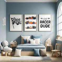 a bedroom with blue walls and pictures on the wall, including a race car bed