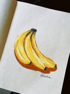 a drawing of three bananas sitting on top of a piece of paper