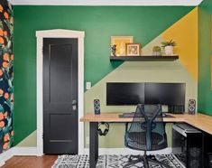 a home office with green and yellow walls