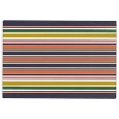 a place mat with multicolored stripes on it