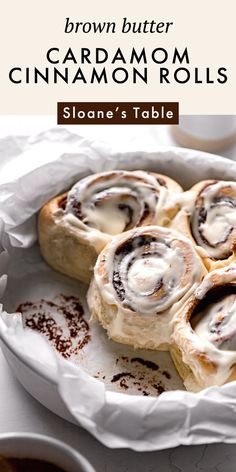 brown butter cinnamon rolls in a white dish