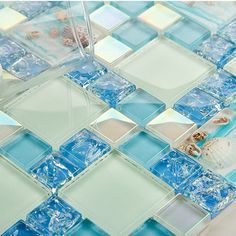 blue and white glass mosaic tile with sea shells