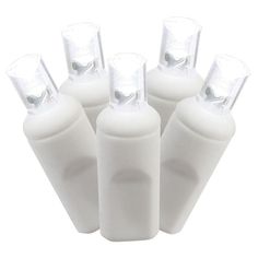 six white plastic bottles with clear caps