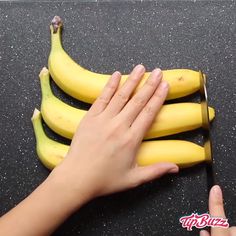 a person is cutting bananas with a knife