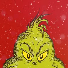 an image of a green monster with yellow eyes on a red background and snow flakes