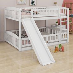 a white bunk bed with a slide on the bottom and pink walls in the background