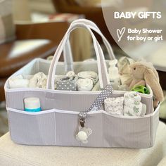 a baby diaper bag sitting on top of a chair