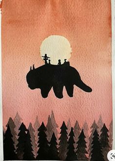 an elephant with two people riding on it's back in front of the moon