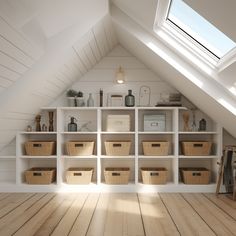 an attic with white walls and shelves filled with baskets, bookshelves and other items