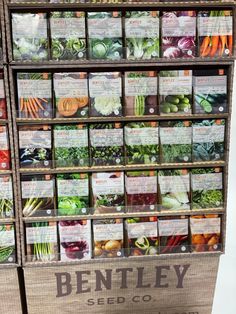 a display case filled with lots of different types of vegetables