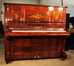 an old piano is sitting in the garage