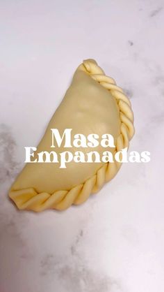 a piece of food with the words masa empanadas on it