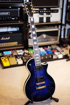 an electric guitar sitting on top of a table