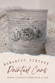 an old fashioned tin can with roses on it