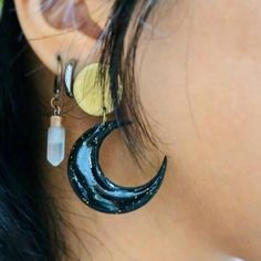 The top half of the earring represents the Sun, the center of our solar system and the biggest star within; hanging below the new crescent Moon, dotted with a myriad of gold glitter like the stars of the night sky.  This piece is great for various occasions: On theme with Spooky Season, the crescent Moon also signifies the beginning and end of the holy month of Ramadhan ☪  Model: See Yan Sun And Stars, Big Star, Crescent Moon, Star Earrings, Gold Glitter, Sun, Moon, Jewelry Earrings Dangle, Dangle Earrings