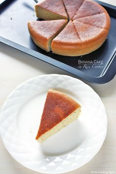 a slice of cake on a plate next to a pan with the rest of it