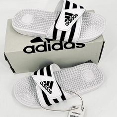 adidas Unisex-Adult Adissage Slides Sandal White / Black Nubs Mens 6 Womens 7 
new in box
great massaging slides for shower, gym, pool, beach, dorm, etc.
hook and loop closure
Lightweight slides with soft cushioning
Hook-and-loop closure for an adjustable fit
Single-bandage EVA upper for lightweight comfort; EVA massage nubs on footbed
Cloudfoam midsole and memory foam sockliner for step-in comfort and superior cushioning

*****Unisex product is men's sizing. Women should size down 1 to 1.5 sizes

smoke free, pet friendly home
I ship M-F

What is JUMBLE JOY?  
JUMBLE JOY is a feeling you get when you find the perfect something amongst many that brings you immense happiness and JOY!  My business is all about helping people connect with a special item that will bring a smile to their face an Beach Dorm, Gym Pool, Men's Sandals, Pool Beach, Mens Sandals, Hook And Loop, My Business, Dress Codes, Slide Sandals