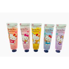 hello kitty hand creams are lined up in the same color as they appear on each tube