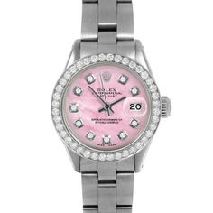 SKU#: 6917-SS-PMOP-DIA-AM-BDS-OYSPre-Owned Rolex 6917 Ladies 26mm Datejust Watch, Custom Pink Mother of Pearl Diamond Dial & Custom 1ct Diamond Bezel on Rolex Stainless Steel Oyster Band Model#: 6917 Case: Rolex 26mm Stainless Steel Case Movement: Rolex Automatic 2035 Caliber Dial: Custom Pink Mother of Pearl Dial with Diamond Hour Markers (Not Made by Rolex) Bezel: Custom 1ct Diamond Bezel (Not Made by Rolex) Band: Rolex Stainless Steel Oyster Band This Beautiful Watch Comes Fully Serviced, Pol Pink Watch With Diamond Hour Markers, Pink Diamond Watch With Diamond Hour Markers, Timeless Pink Diamond Watch, Pink Timeless Round Diamond Watch, Rolex 26mm, Wooden Watch Box, Used Rolex, Red Diamond, Wooden Watch