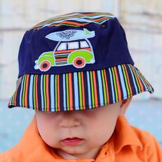 These hats are soft, sweet and everything neat. Sun protection is a must, so we do it in style! Each sun hat design includes a chin strap and UV protection. Perfect for pool side, a day at the park, beach or lake!Head Circumference:3-12m - 46cm12-2t - 49cm2-4y - 52cm****Dino Style only available in sizes 3-12m and 12-2t.Jamie Rae Hats has become a favorite of moms & babies across the globe due to their comfortable fit, incredible selection & unbeatable quality! Each hat & headband ar Infant Sun Hat, Newborn Sun Hat, Baby Boy Sun Hat, Baby Bow Hats, Girls Sun Hat, Hat Headband, Day At The Park, Baby Sun Hat