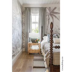 a bed room with a neatly made bed next to a wooden dresser and window covered in curtains