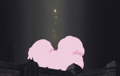 a large pink object floating in the air