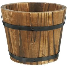 a wooden bucket with black straps around it