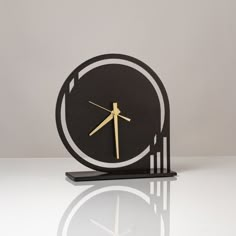 a clock that is sitting on top of a table