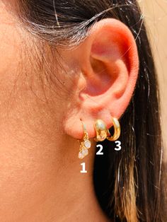 18kt Gold Filled Mini Hoop Earrings. The perfect ear stack.  Nickel Free- Waterproof- Tarnish Resistant- Hypoallergenic Price per hoop- Also sold as set Option 1: Hoop Size: 11mm Drop: Approx 14mm Option 2: Hoop Size: 10mm Width: 2mm Option 3: Hoop Size: 12mm Width: 5.5mm Experience the beauty and durability of 18 Karat Gold Filled. Our pieces are crafted with a thick layer of genuine 18 Karat gold bonded to a base metal, ensuring a long-lasting and high-quality piece of jewelry. Unlike gold-pla Gold Huggie Earrings With Dangling Charms For Everyday, 14k Gold Filled Huggie Earrings With Dangling Charms, Everyday Gold Huggie Earrings With Dangling Charms, Everyday Teardrop Huggie Earrings With Lever Back, 14k Gold-filled Huggie Earrings With Dangling Charms, Gold Drop Huggie Earrings For Everyday, Gold Drop Huggie Earrings Hypoallergenic, Delicate Gold-plated Huggie Earrings, Huggie Earrings With Dangling Charms