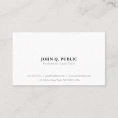 a white business card with the words, john q public written in black on it