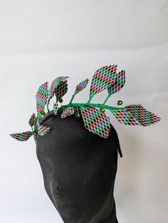 African print leaf crown with crystal gemstones  headpiece attached to an alice band. Green Crown, Leaf Crown, Mini Hats, Wedding Fascinators, Alice Band, Wedding Hair Accessories, Crystals And Gemstones, African Print, Fascinator